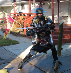 nick cutting bamboo with outfit